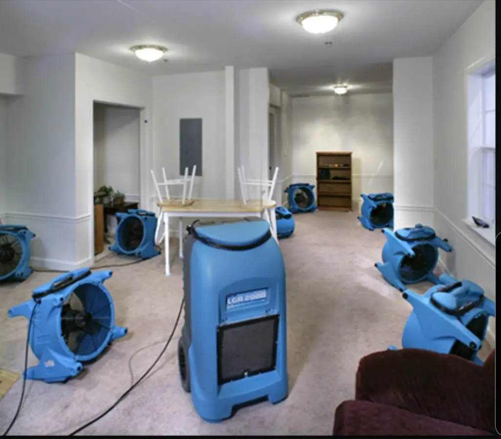 Air movers and dehumidifier setup for Water Damage Restoration in Seneca